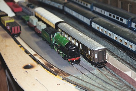 No.18 'Goldberry' in the Bree freight sidings waiting to haul a mixed freight service to Buckland. To the right stands the Motorail coaches, with Bree Intercity coaches beyond.