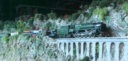 No.5 'Gandalf' hauling an inter-city freight service through the rugged North Shire landscape towards Mitchel Delving.